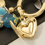 Heart Locket And Flower Charm Earrings