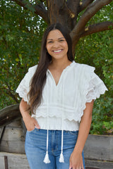 Brooks Eyelet Embroidered Tassel Top