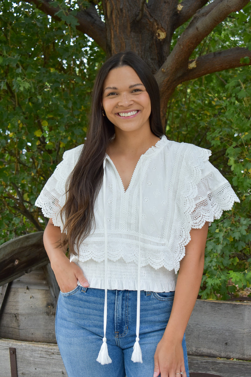 Brooks Eyelet Embroidered Tassel Top