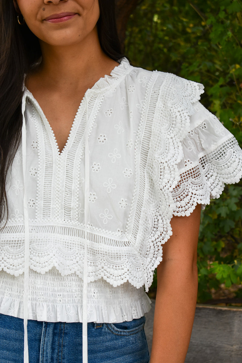 Brooks Eyelet Embroidered Tassel Top