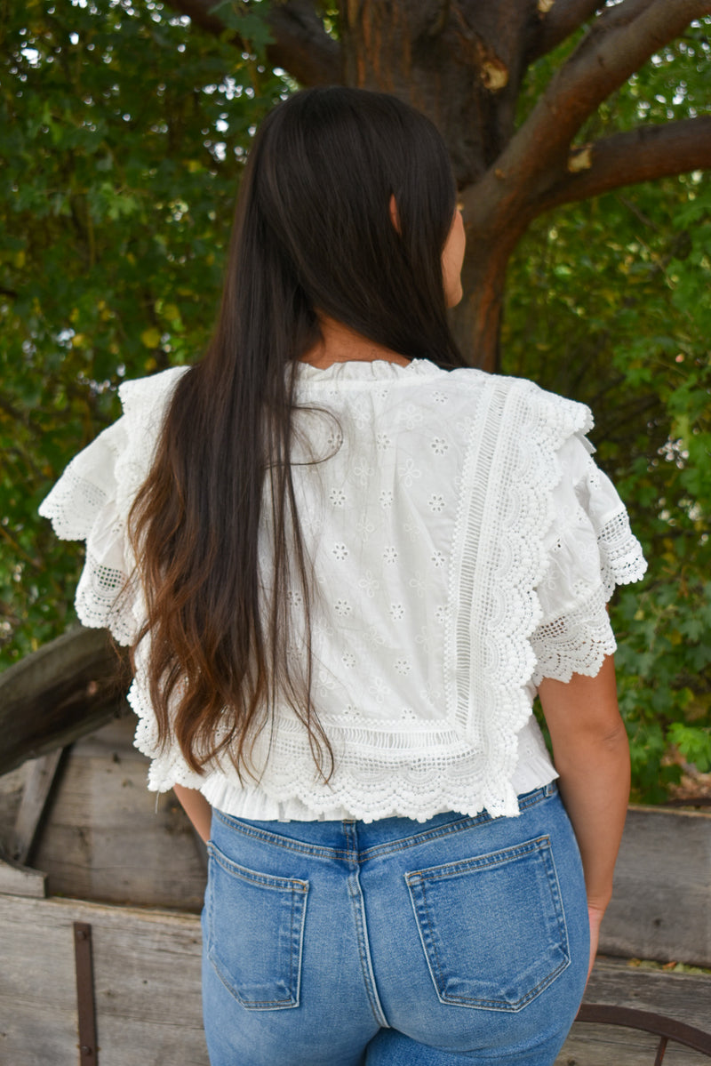 Brooks Eyelet Embroidered Tassel Top